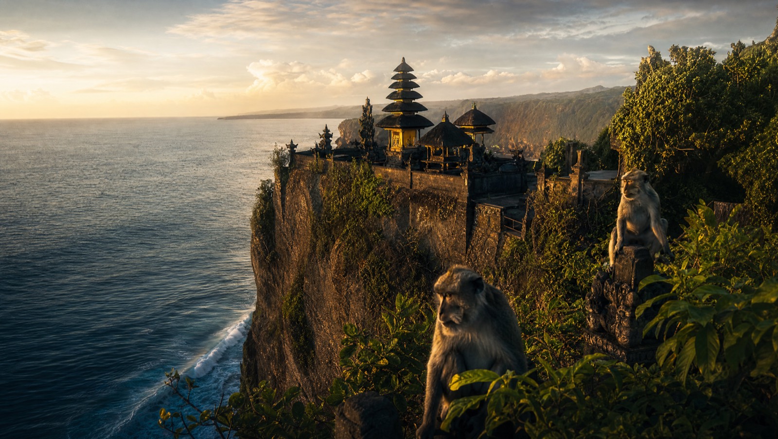 Clifftop Balinese sea temple on the northwest coast with macaques